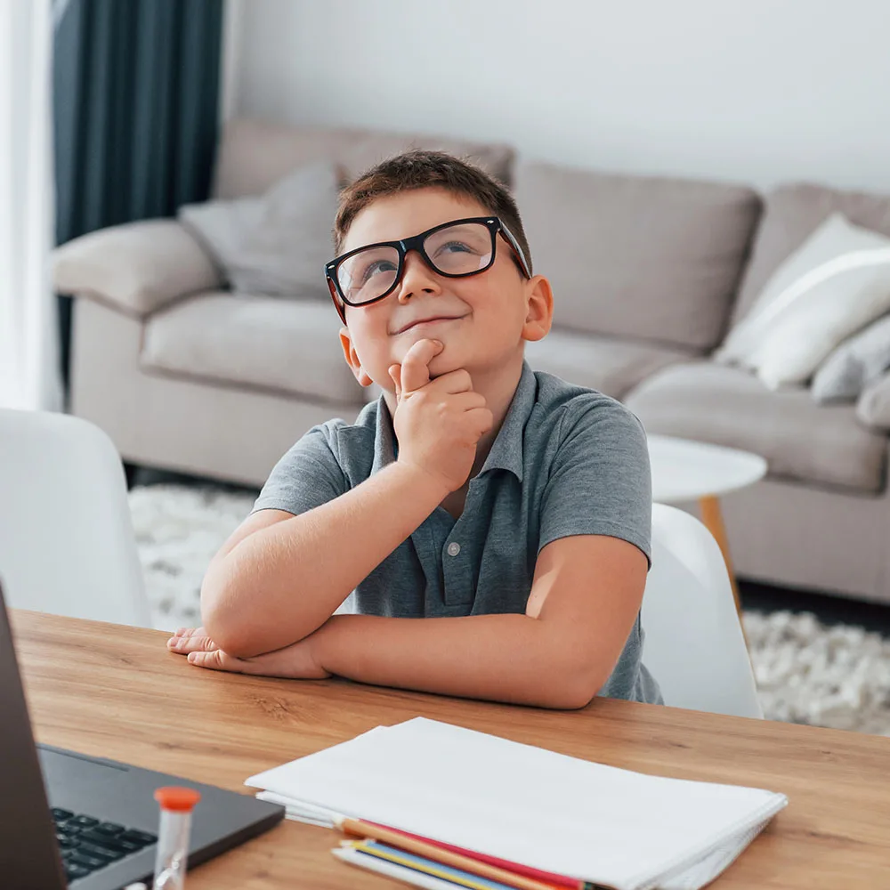 Child participating in a learning activity at home